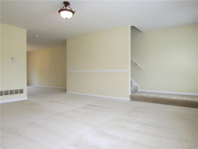 6921 Spring Valley Ln, Murrysville, PA 15632 - carpeted spare room featuring stairway and baseboards