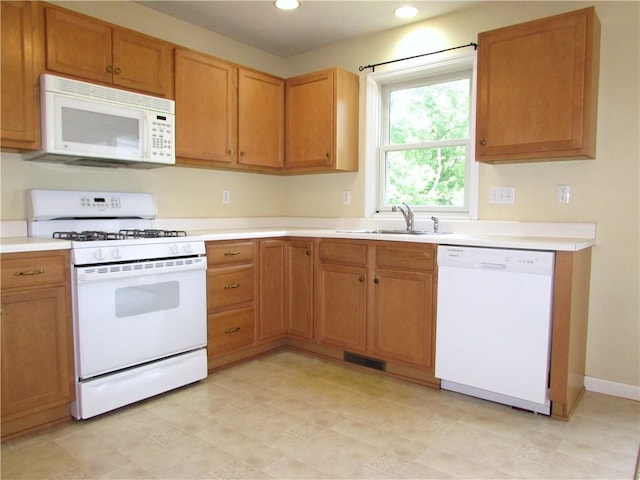 6921 Spring Valley Ln, Murrysville, PA 15632 - kitchen featuring white appliances, light countertops, and recessed lighting