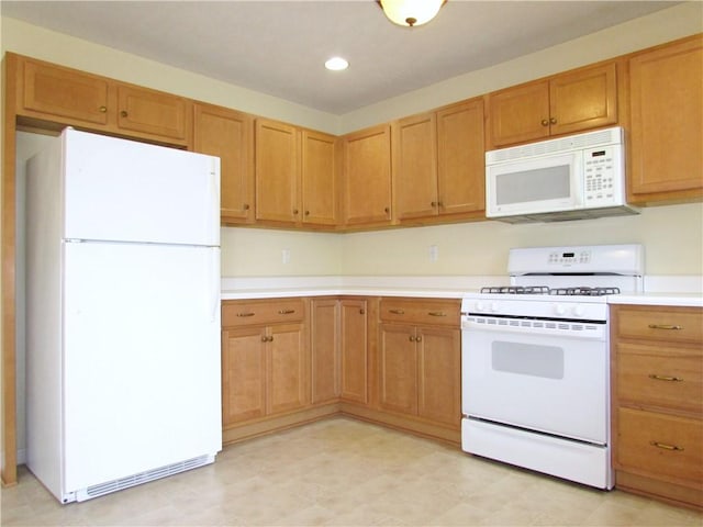 6921 Spring Valley Ln, Murrysville, PA 15632 - kitchen featuring white appliances, light countertops, and recessed lighting