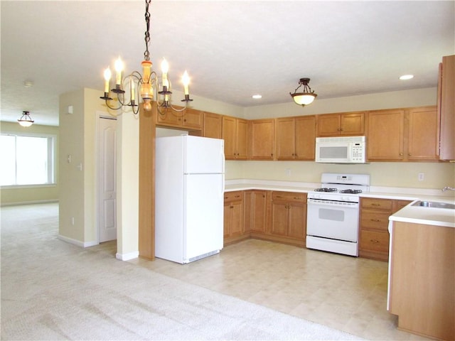 6921 Spring Valley Ln, Murrysville, PA 15632 - kitchen featuring white appliances, a chandelier, light colored carpet, light countertops, and recessed lighting