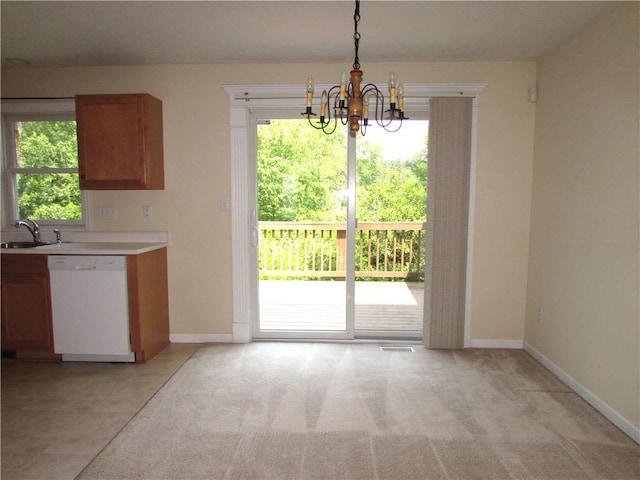 6921 Spring Valley Ln, Murrysville, PA 15632 - unfurnished dining area with a chandelier and baseboards