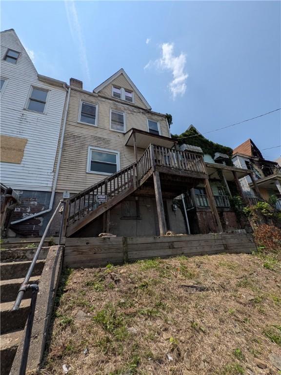 711 Fruit Way, Mckees Rocks, PA 15136 - rear view of property featuring stairs and a deck