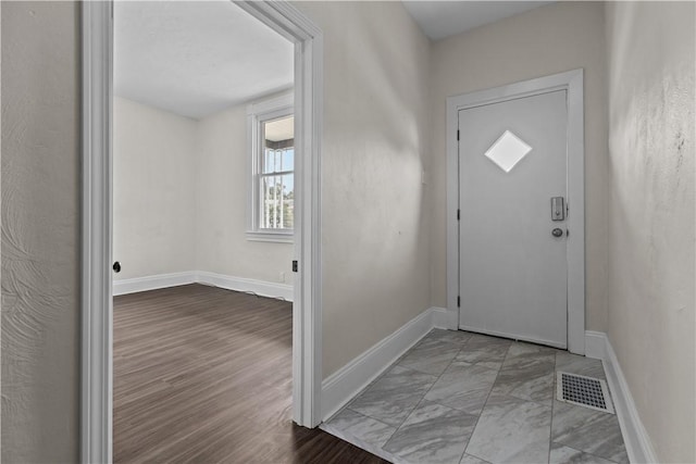 4506 Bowes Ave, West Mifflin, PA 15122 - entrance foyer featuring baseboards and marble look tiles