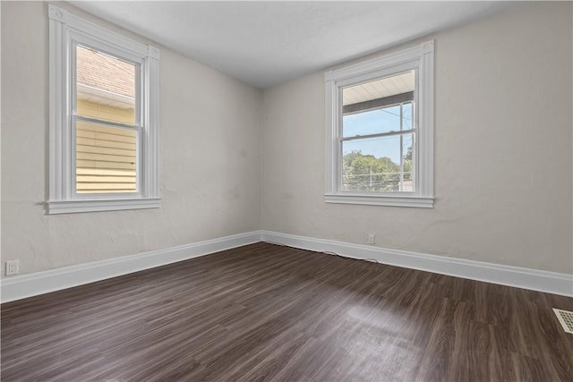 4506 Bowes Ave, West Mifflin, PA 15122 - empty room with dark wood-type flooring and baseboards