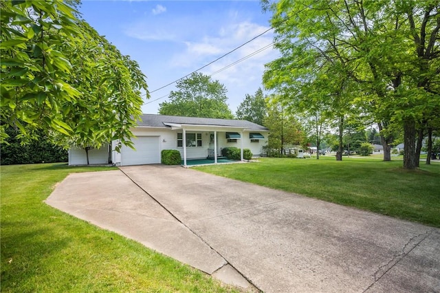 2485 Victoria Dr, Hermitage, PA 16148 - ranch-style house with an attached garage, a front yard, concrete driveway, and covered porch