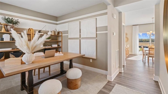 364 Leslie Farms Dr, Connoquenessing Boro, PA 16033 - office area with wood finished floors and a chandelier