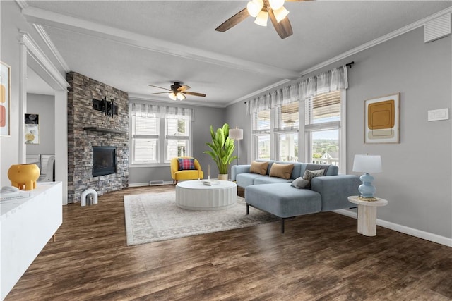 710 Duncan Ave, City Of Washington, PA 15301 - living area with a ceiling fan, beam ceiling, a stone fireplace, wood finished floors, and crown molding