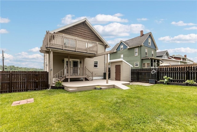 710 Duncan Ave, City Of Washington, PA 15301 - back of house featuring a balcony, a storage shed, a fenced backyard, and a patio