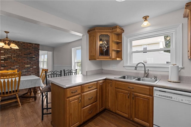 217 Orchard St, West Deer, PA 15006 - kitchen with dishwasher, dark wood-style flooring, and brown cabinetry
