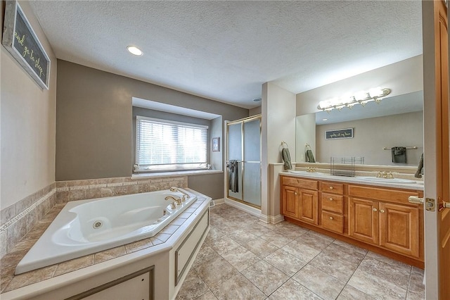 2023 Sterling Dr, South Fayette, PA 15057 - full bath featuring a shower stall, double vanity, a whirlpool tub, and a textured ceiling