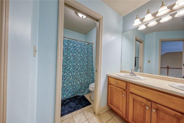 2023 Sterling Dr, South Fayette, PA 15057 - bathroom featuring tile patterned floors, double vanity, and a shower with curtain