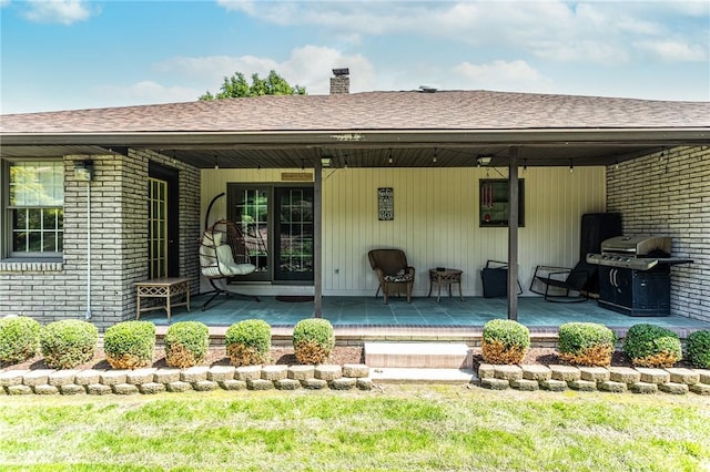 406 Dove Dr, South Union Twp, PA 15401 - back of house with a chimney, brick siding, a shingled roof, and covered porch
