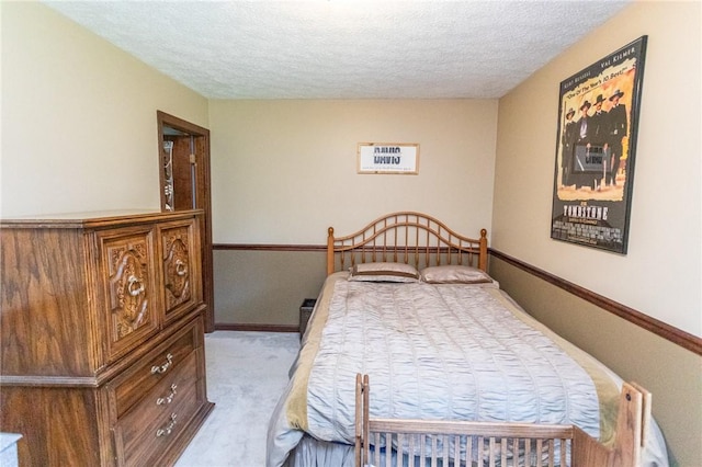 406 Dove Dr, South Union Twp, PA 15401 - bedroom featuring a textured ceiling and carpet flooring