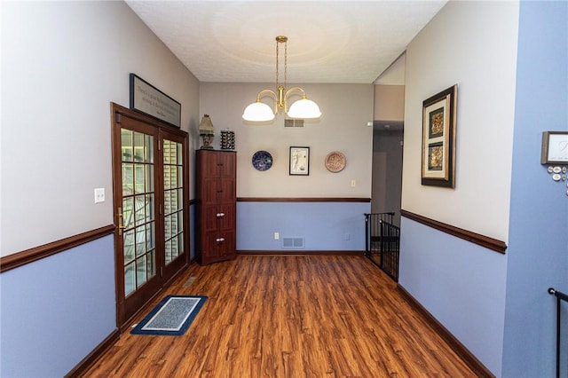 406 Dove Dr, South Union Twp, PA 15401 - unfurnished dining area with wood finished floors and a chandelier