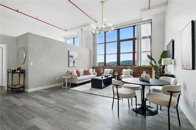 5850 Centre Ave Unit 605, Shadyside, PA 15206 - living area with wood finished floors and a chandelier