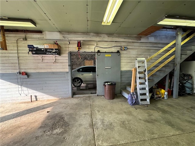 203 10th, St, PA 15963 - garage featuring wood walls