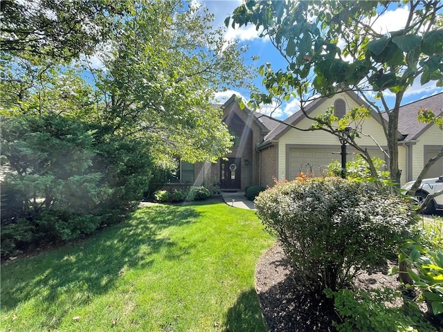 518 Farndale Rd, Ohara, PA 15238 - view of side of home with an attached garage, a lawn, and brick siding