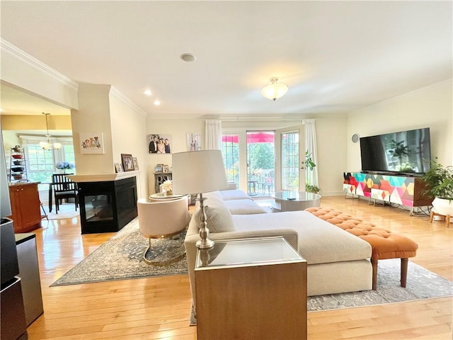 518 Farndale Rd, Ohara, PA 15238 - living area featuring ornamental molding, plenty of natural light, light wood-style flooring, a chandelier, and recessed lighting