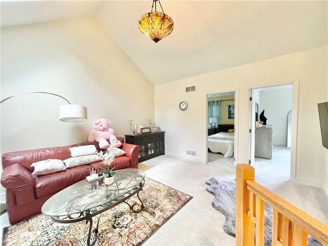 518 Farndale Rd, Ohara, PA 15238 - carpeted living room with vaulted ceiling and baseboards