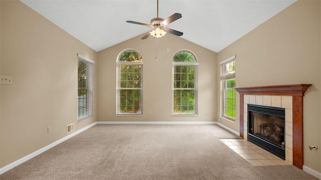 103 Cambridge Ct, Springdale Twp, PA 15049 - unfurnished living room featuring carpet flooring, a ceiling fan, a tile fireplace, and vaulted ceiling