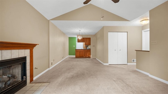 103 Cambridge Ct, Springdale Twp, PA 15049 - unfurnished living room featuring a fireplace, light carpet, a ceiling fan, and lofted ceiling