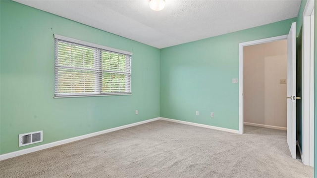 103 Cambridge Ct, Springdale Twp, PA 15049 - empty room featuring carpet flooring and a textured ceiling