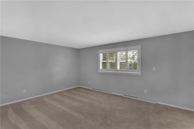 425 Ridge Rd, Hempfield Twp Wml, PA 15601 - carpeted spare room featuring baseboard heating