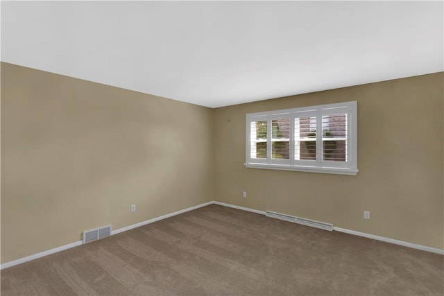 425 Ridge Rd, Hempfield Twp Wml, PA 15601 - carpeted empty room with a baseboard heating unit and baseboards