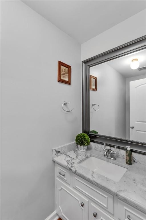 425 Ridge Rd, Hempfield Twp Wml, PA 15601 - bathroom featuring vanity and baseboards