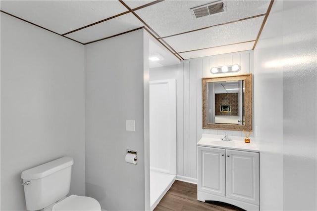 425 Ridge Rd, Hempfield Twp Wml, PA 15601 - half bath featuring vanity and wood finished floors