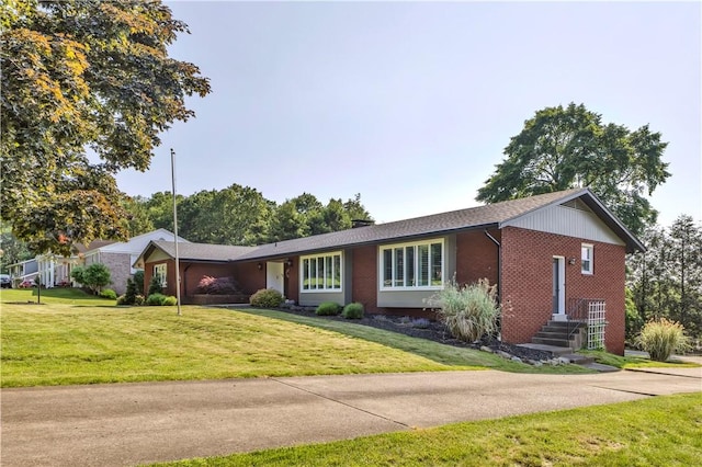 425 Ridge Rd, Hempfield Twp Wml, PA 15601 - single story home with brick siding and a front yard