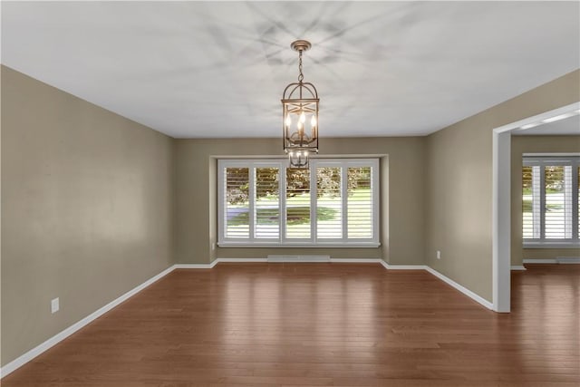 425 Ridge Rd, Hempfield Twp Wml, PA 15601 - unfurnished dining area featuring a chandelier and wood finished floors