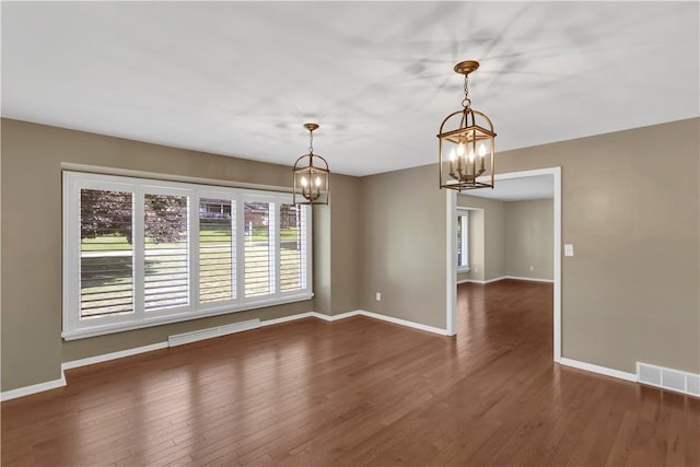425 Ridge Rd, Hempfield Twp Wml, PA 15601 - unfurnished room featuring a chandelier and wood finished floors