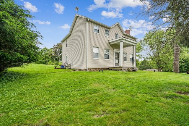 215-217 Fairlawn Dr, Monroeville, PA 15146 - rear view of property featuring a chimney and a yard