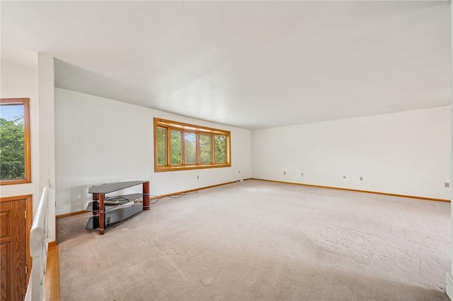215-217 Fairlawn Dr, Monroeville, PA 15146 - unfurnished living room featuring plenty of natural light and light carpet