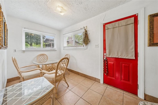 215-217 Fairlawn Dr, Monroeville, PA 15146 - dining space with a textured ceiling and light tile patterned flooring