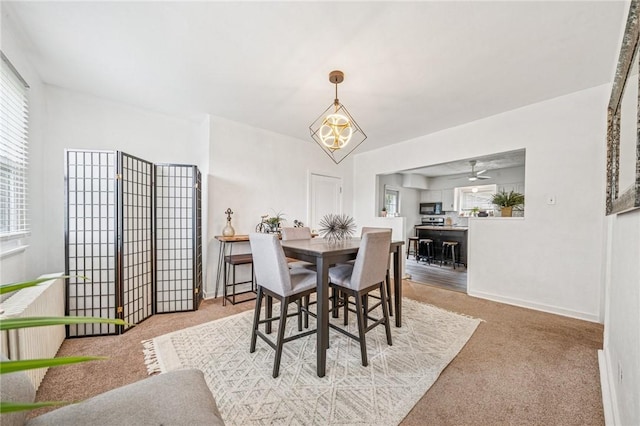215-217 Fairlawn Dr, Monroeville, PA 15146 - carpeted dining space with healthy amount of natural light and ceiling fan