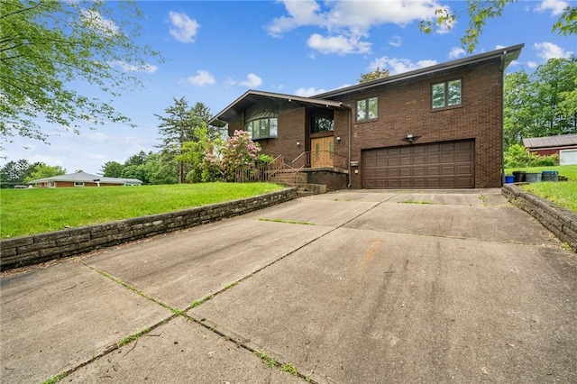 215-217 Fairlawn Dr, Monroeville, PA 15146 - view of front facade with an attached garage, concrete driveway, brick siding, and a front yard