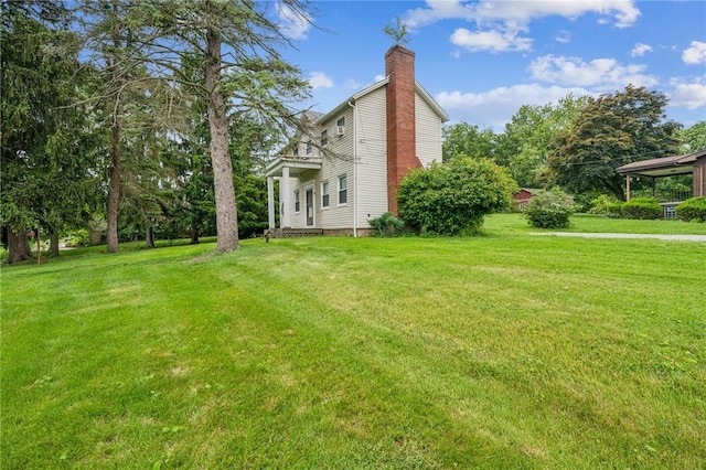 215-217 Fairlawn Dr, Monroeville, PA 15146 - view of home's exterior with a chimney and a lawn