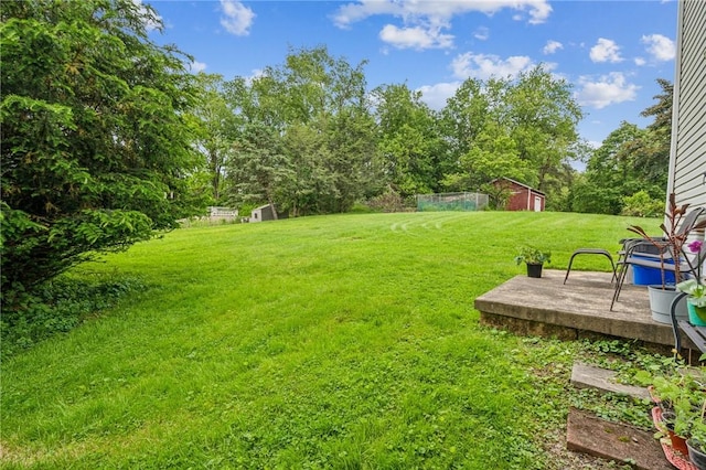215-217 Fairlawn Dr, Monroeville, PA 15146 - view of green lawn featuring a storage shed and view of scattered trees