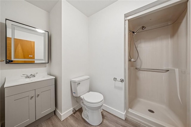 215-217 Fairlawn Dr, Monroeville, PA 15146 - bathroom featuring vanity, wood finished floors, and a shower