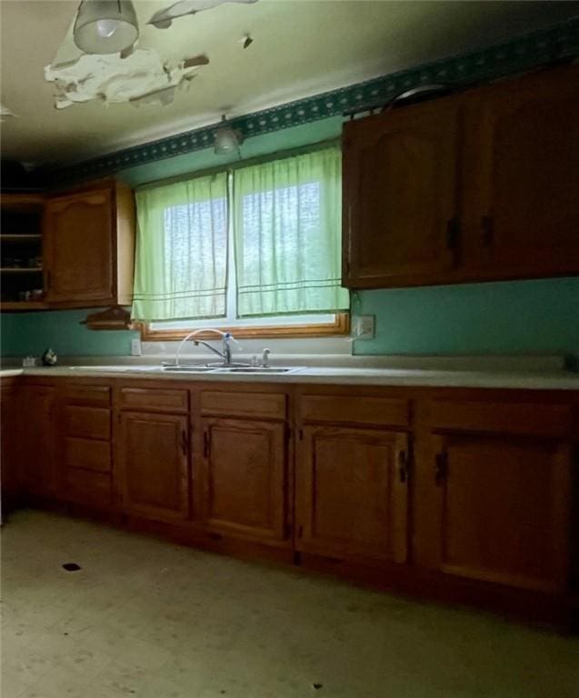 594 E Main St, Pine Twp Mer, PA 16127 - kitchen featuring brown cabinets, light flooring, and light countertops