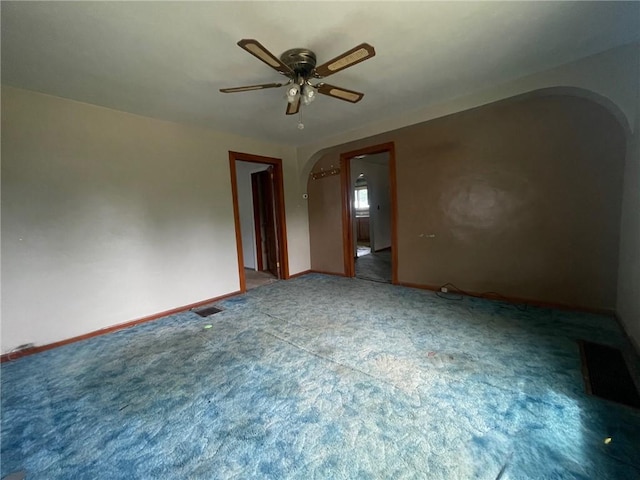 594 E Main St, Pine Twp Mer, PA 16127 - carpeted spare room featuring arched walkways and a ceiling fan