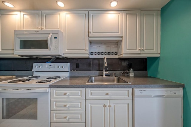 320 Fort Duquesne Blvd Unit 26N, Downtown Pgh, PA 15222 - kitchen with white appliances, white cabinetry, decorative backsplash, dark countertops, and recessed lighting