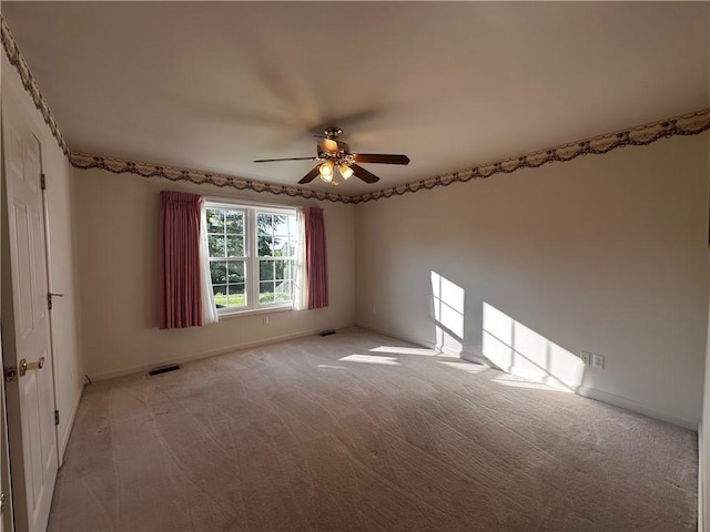 207 Village Ct, South Strabane, PA 15301 - spare room featuring light colored carpet and a ceiling fan