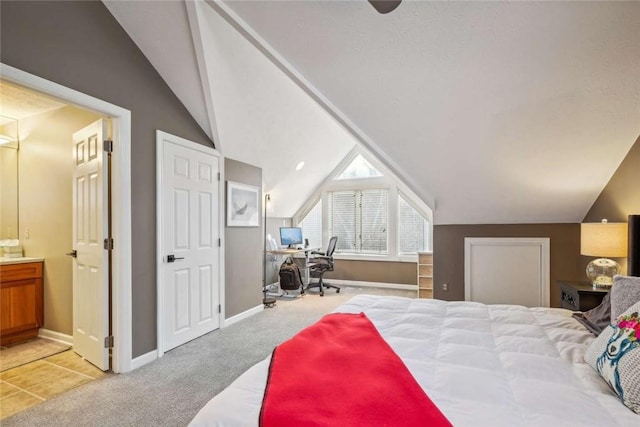 71 Waterfront Dr, Washingtons Landing, PA 15222 - bedroom featuring vaulted ceiling, an office area, ensuite bath, and light carpet
