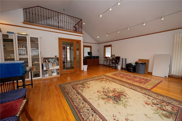 200 School St, Green Tree, PA 15220 - living area with wood finished floors, rail lighting, and vaulted ceiling
