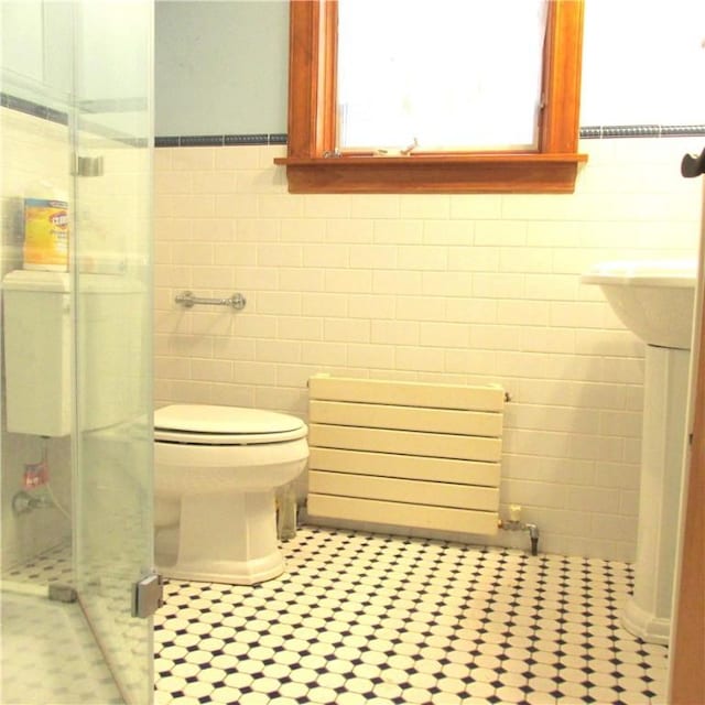 200 School St, Green Tree, PA 15220 - bathroom featuring tile walls, a stall shower, and tile patterned flooring