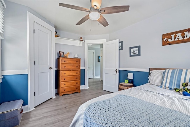 401 Stanford Ave, Ross Twp, PA 15229 - bedroom with wood finished floors and ceiling fan