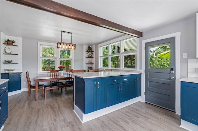 401 Stanford Ave, Ross Twp, PA 15229 - kitchen featuring blue cabinets, open shelves, light countertops, light wood finished floors, and beam ceiling